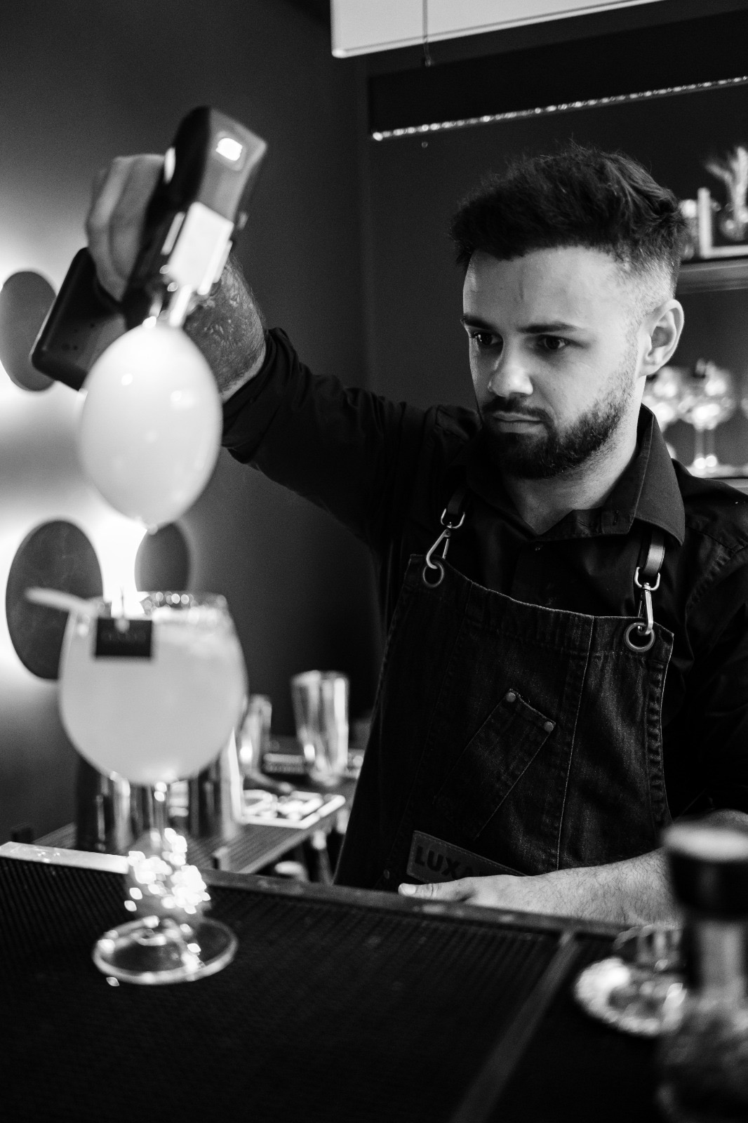 Bartender serving champagne